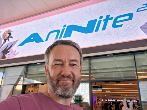 Visitor beneath the AniNite banner