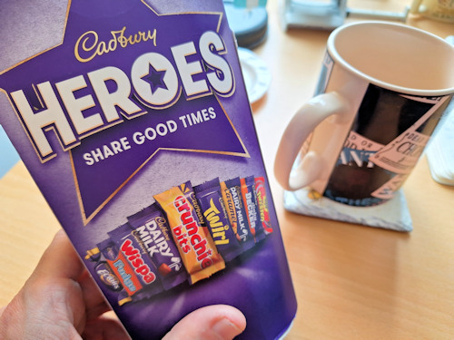 Box of chocolates and a mug