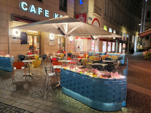 Outdoor café seating at night