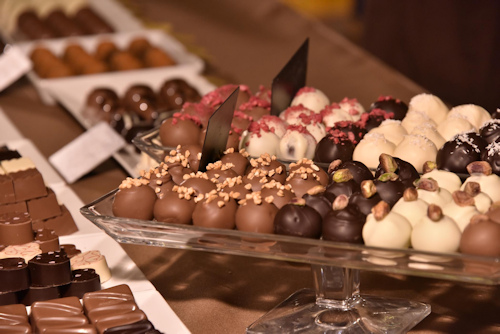 Chocolate pralines on a glass stand