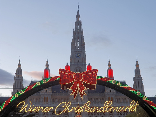 Rathaus behind the lighted arch of the Christkindlmarkt