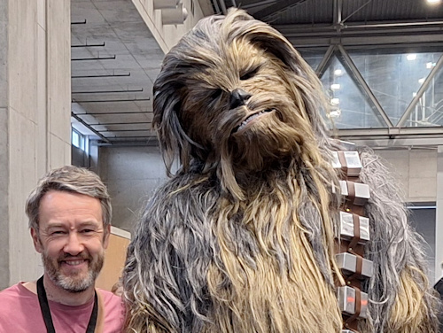 Man next to a wookie