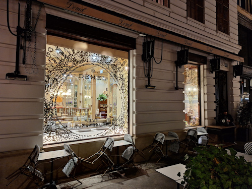 Lighted café window at night