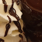 Chocolate dessert and cream