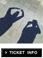 Shadows of people taking photos