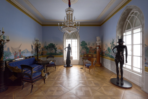 Room with Biedermeier furniture and mannequins