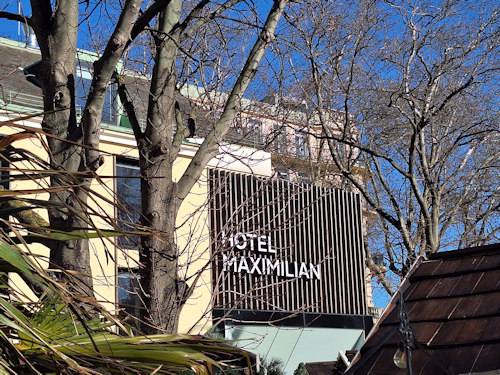 Hotel Maximilian through the trees