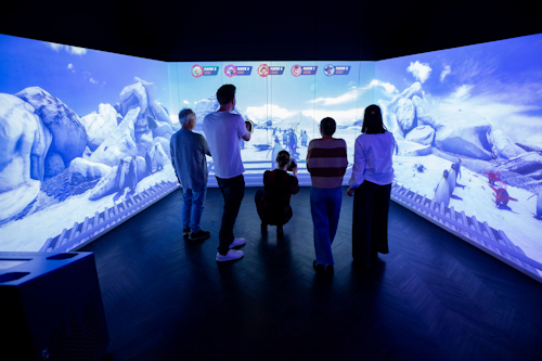 Family playing a virtual animal game