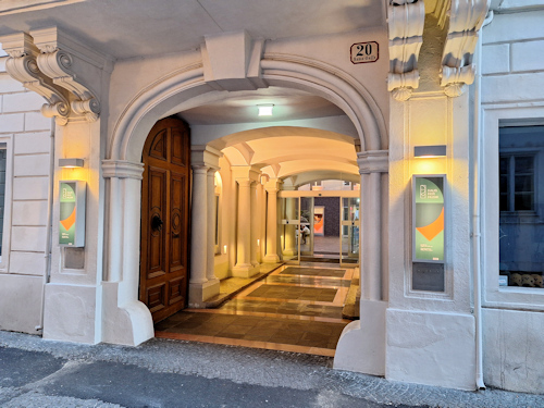 Lighted entrance to a historical building