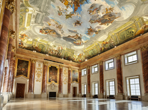 Large baroque room with ceiling frescoes