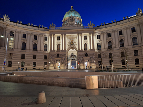 Nighttime view of Michaelerplatz square