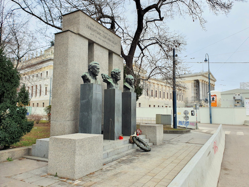 Monument and three busts