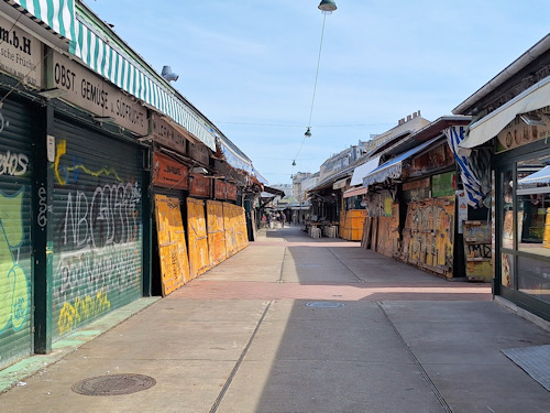 Closed market stalls on a Sunday