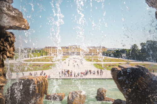 View of a palace through a fountain grotto