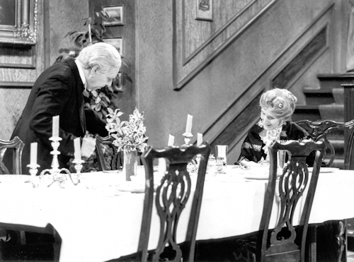 Scene from Dinner for One with butler and his employer at the table