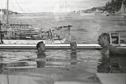 Photo of Lyndon Johnson and advisers in a pool