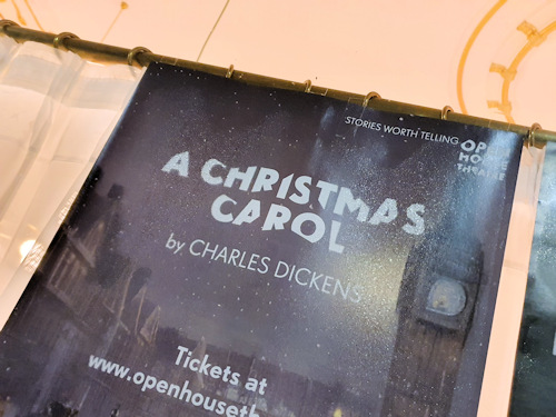 Window advertisement for A Christmas Carol