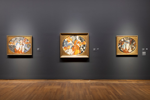 Three paintings on display in the Oppenheimer exhibition