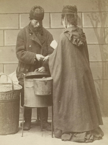 A roast chestnut seller around 1875