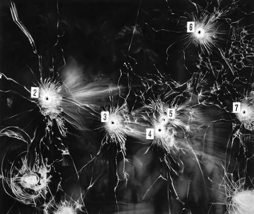 Charcoal drawing of bullet holes