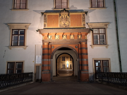 A renaissance castle entrance at night