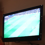 TV screen showing football