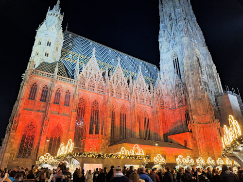 Christmas market stalls in front of a cathedral