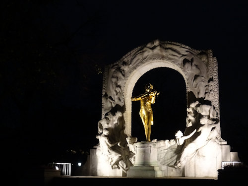 Strauss statue at night