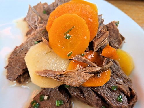 Beef and sides on a plate