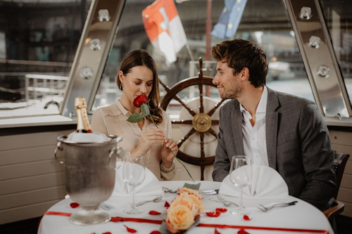 Couple enjoying dinner on a boat