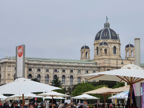 MQ forecourt with a museum in the distance