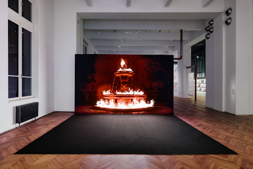 Video wall of a burning fountain