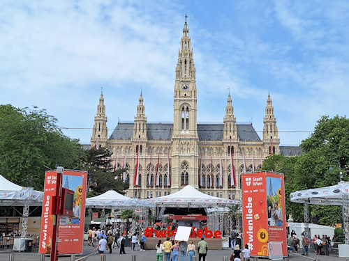 Festival with neogothic building in the background