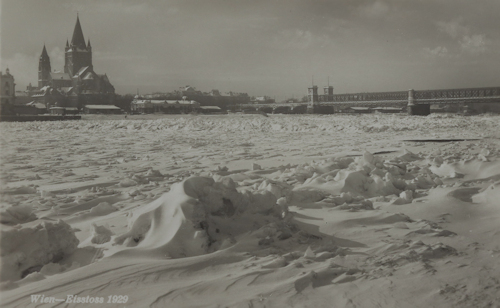 Frozen river with a layer of snow