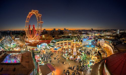 Aerial view of a seasonal market and ferris wheel