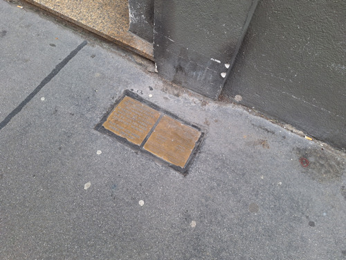 Two brass Jewish memorial stones